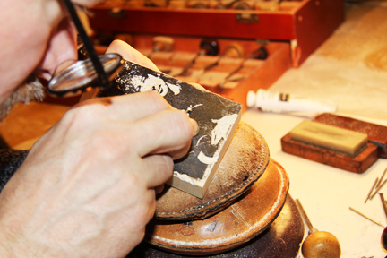 George working on engravings for the Rhyme Maidens book